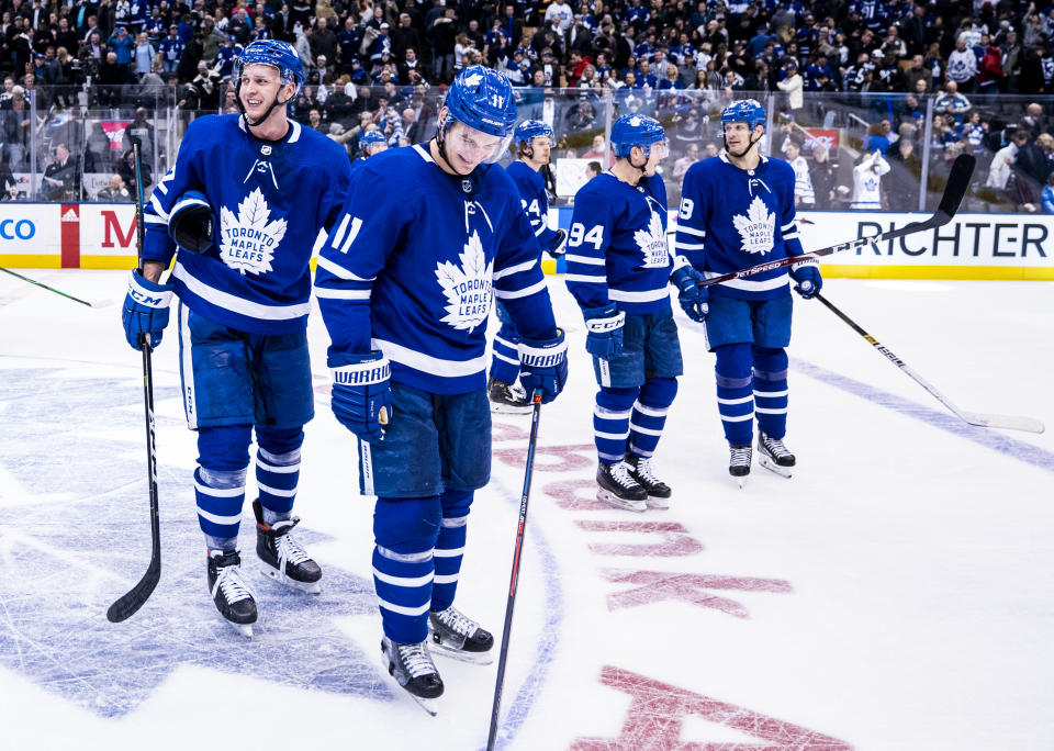 TORONTO, ON - FEBRUARY 29: Martin Marincin #52 of the Toronto Maple Leafs and Zach Hyman #11 celebrate after defeating the Vancouver Canucks at the Scotiabank Arena on February 29, 2020 in Toronto, Ontario, Canada. (Photo by Mark Blinch/NHLI via Getty Images)