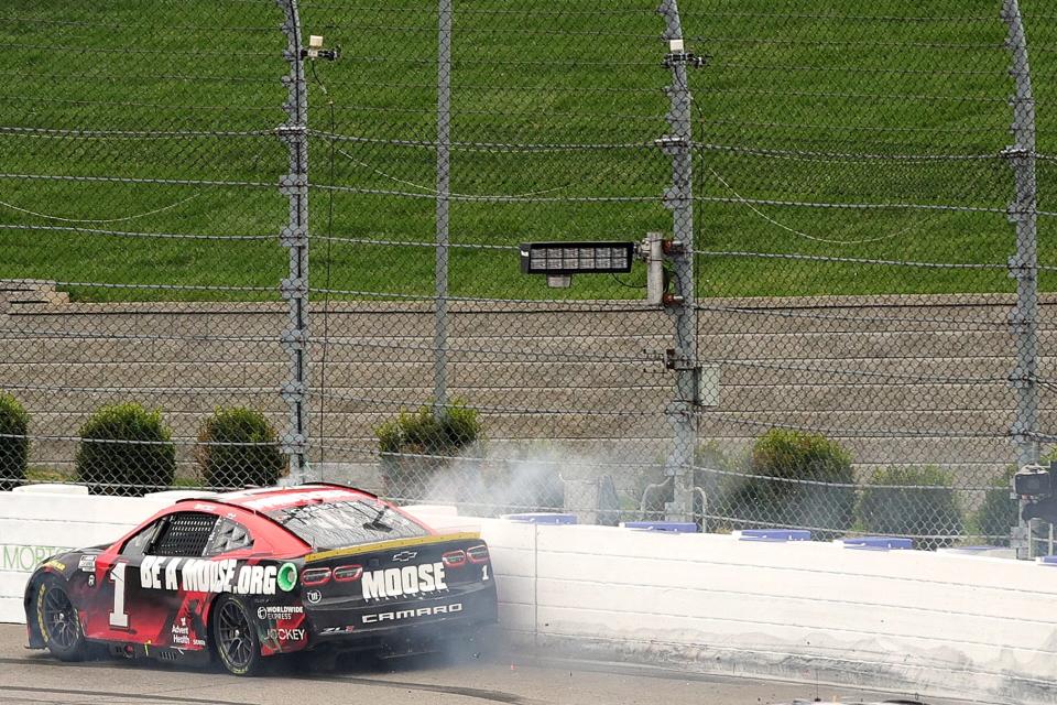 Ross Chastain rides the wall on the final lap of the NASCAR Cup Series Xfinity 500 at Martinsville Speedway.