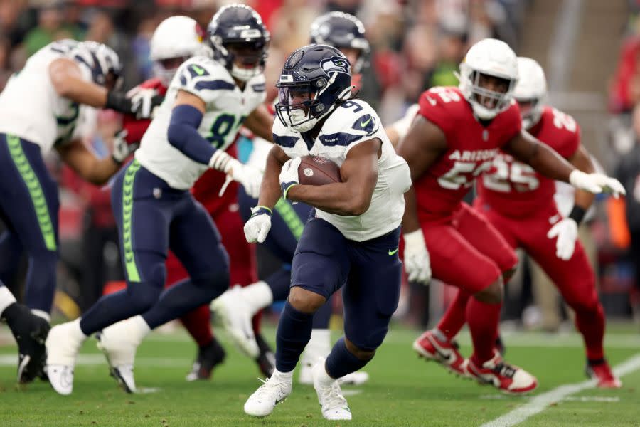 Kenneth Walker III #9 of the Seattle Seahawks runs with the ball during the first quarter against the Arizona Cardinals at State Farm Stadium on January 07, 2024 in Glendale, Arizona. (Photo by Christian Petersen/Getty Images)