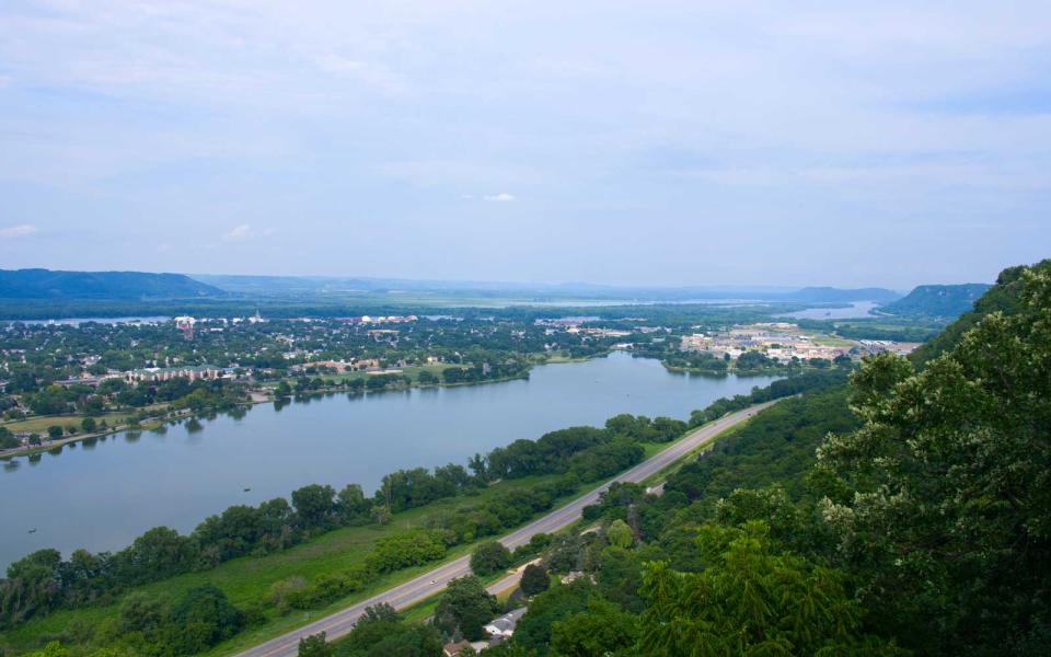 <p>There is at least one festival every month in this Minnesota river town known for its striking bluffs and mountain views. For <a rel="nofollow noopener" href="http://www.travelandleisure.com/slideshows/25-great-american-adventures" target="_blank" data-ylk="slk:those who want adventure;elm:context_link;itc:0;sec:content-canvas" class="link ">those who want adventure</a>, Winona has snowshoeing and cross-country skiing in winter; hiking, kayaking, boating, biking, golfing, and fishing the rest of the year. If you’re more of the dinner-and-a-show type, the town has museums, theaters, and a historic district. If you like both, plan for a longer trip.</p>