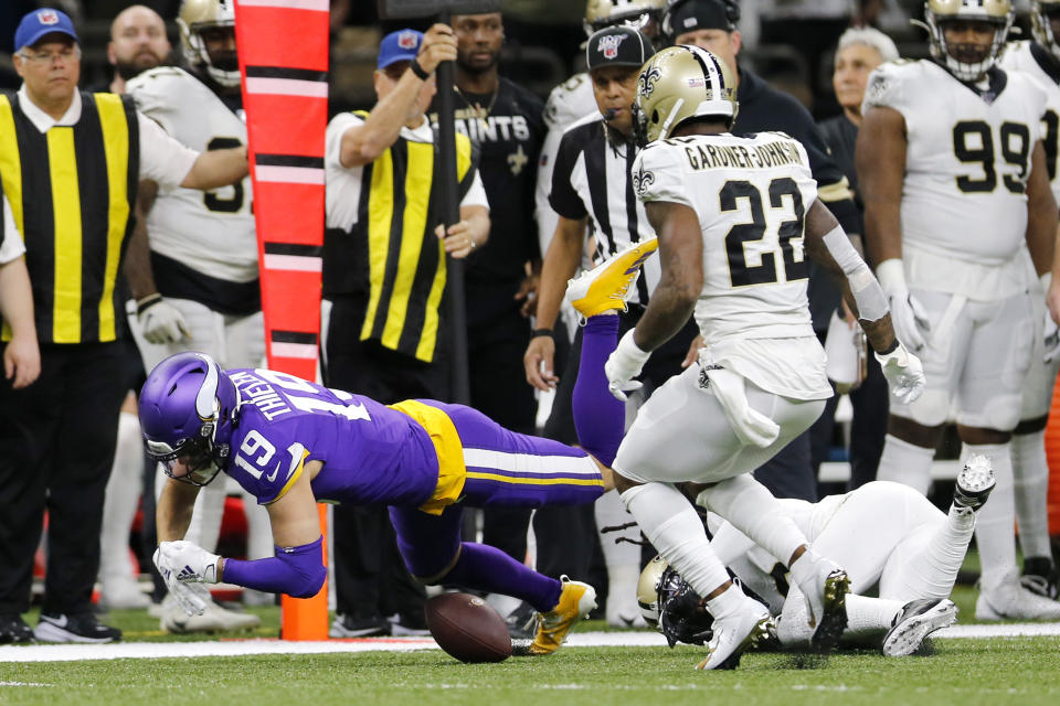 Minnesota Vikings wide receiver Adam Thielen (19) fumble on a pass reception which was recovered by the New Orleans Saints in the first half of an NFL wild-card playoff football game, Sunday, Jan. 5, 2020, in New Orleans. (AP Photo/Brett Duke)