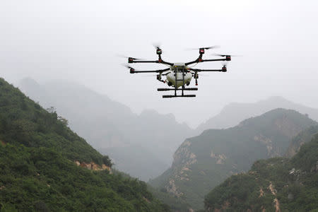 An aerosol drone flies during a training at LTFY drone training school on the outskirts of Beijing, China August 2, 2017. Picture taken August 2, 2017. REUTERS/Jason Lee