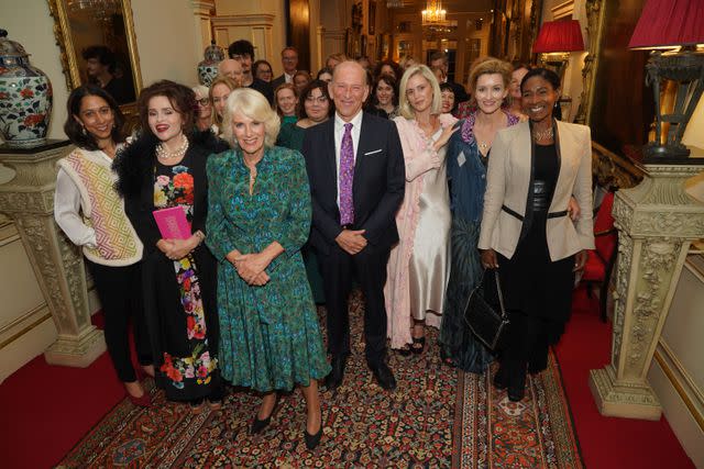 <p>Yui Mok - Pool/Getty</p> Queen Camilla smiles at the Forward Arts Foundation reception at Clarence House on October 11