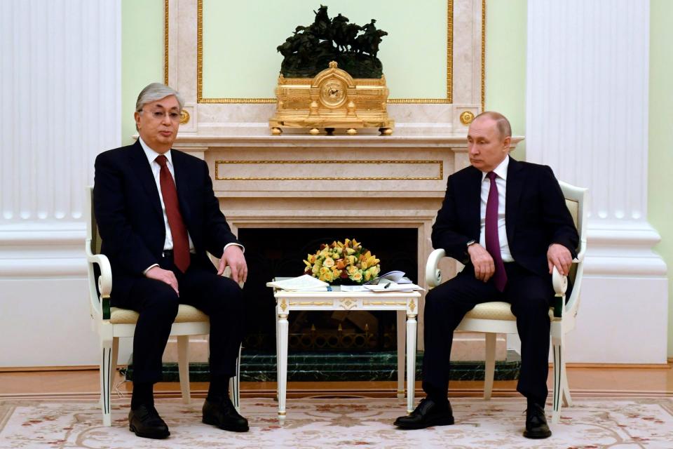Russia's President Vladimir Putin, right, and Kazakhstan's President Kassym-Jomart Tokayev pose for a photo prior to their talks at the Kremlin in Moscow, Russia, Monday, Nov. 28, 2022.