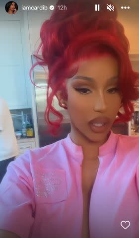 Cardi B shows off fiery new red pixie hairstyle while rapping