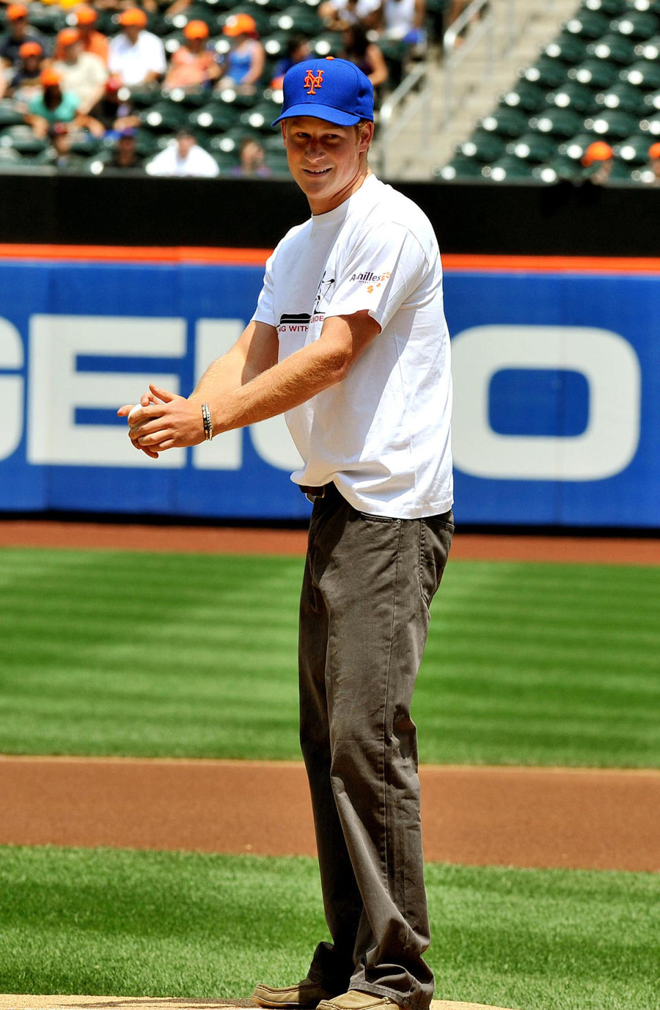 <p>Take Prince Harry out to the ball game! The royal tried his hand at baseball while throwing out the first pitch for the New York Mets in June 2010. </p>