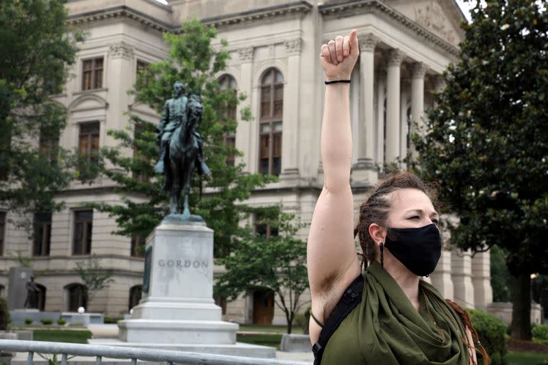 FILE PHOTO: People gather to protest confederate statues outside the Georgia State Capitol