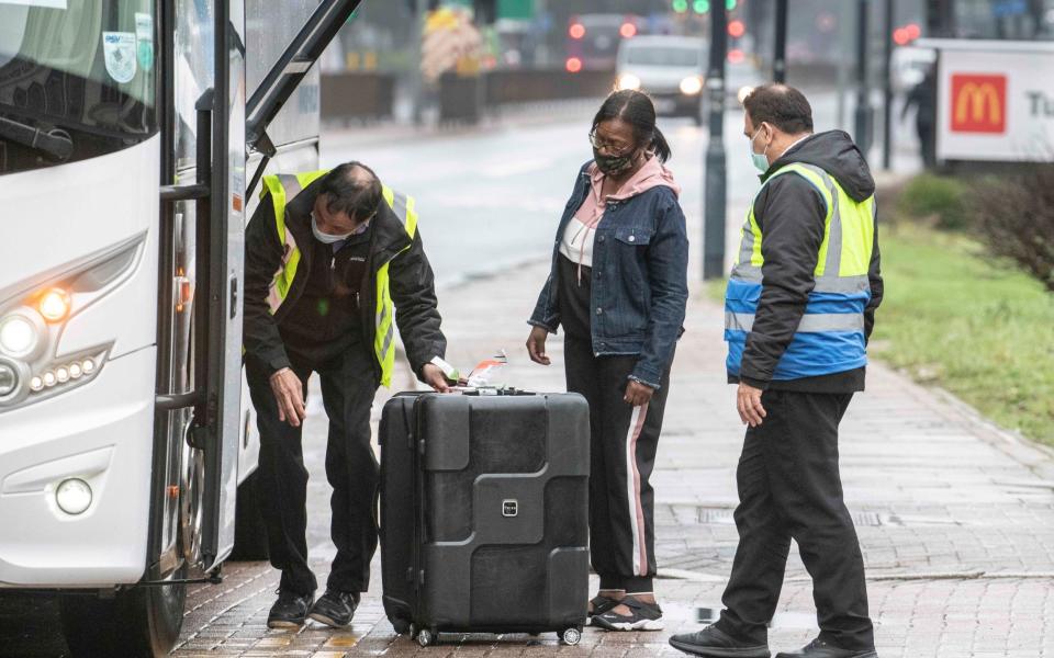A passenger who arrived at Heathrow this morning was taken by coach to the nearby Radisson Blu Hotel to quarantine - JULIAN SIMMONDS/ JULIAN SIMMONDS FOR THE TELEGRAPH