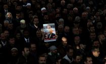 FILE PHOTO: People attend a symbolic funeral prayer for Saudi journalist Jamal Khashoggi at the courtyard of Fatih mosque in Istanbul