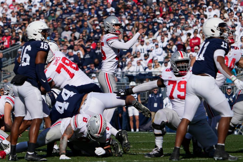 Oct 29, 2022; University Park, Pennsylvania, USA; Ohio State Buckeyes place kicker Noah Ruggles (95) kicks a field goal during the first half of the NCAA Division I football game against the Penn State Nittany Lions at Beaver Stadium. Mandatory Credit: Adam Cairns-The Columbus Dispatch