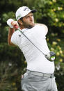 Jon Rahm, of Spain, watches his tee shot on the 16th hole during the second round of the AT&T Byron Nelson golf tournament in McKinney, Texas, Friday, May 14, 2021. (AP Photo/Ray Carlin)