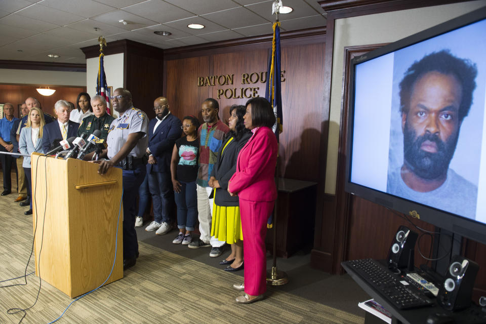 Baton Rouge area law enforcement officials including BRPD Chief Murphy Paul, at lectern, announce the arrest of Ronn Jermaine Bell, 38, shown on monitor at right, Tuesday July 16, 2019 in the recent murder of community activist and Baton Rouge African-American History Museum founder Sadie Roberts-Joseph. (Travis Spradling/The Advocate via AP)