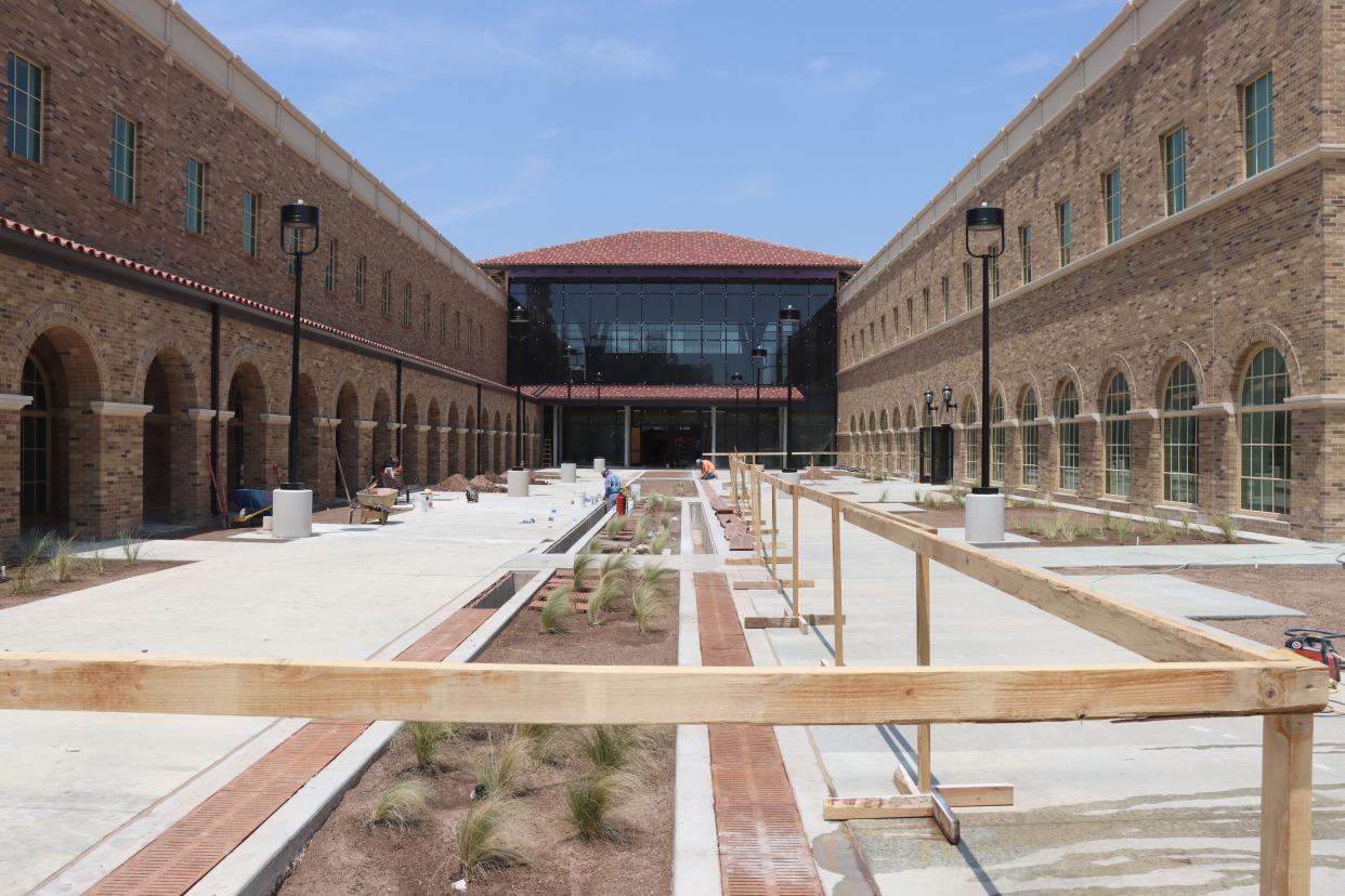Work continues on the courtyard between the east and west wings of the Texas Tech University School of Veterinary Medicine in Amarillo. Construction is finishing up after nearly two years, with classes set to begin Aug. 16.