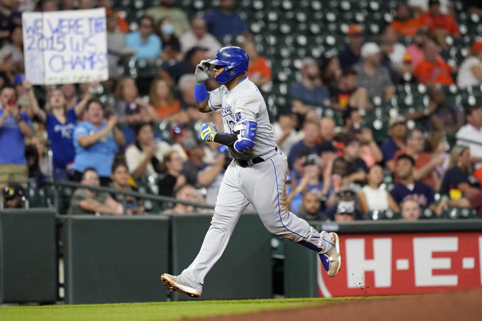 Kansas City Royals' Salvador Perez celebrates after hitting a home run against the Houston Astros during the third inning of a baseball game Monday, Aug. 23, 2021, in Houston. (AP Photo/David J. Phillip)