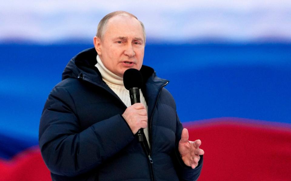 Russian President Vladimir Putin delivers his speech at the concert marking the eighth anniversary of the referendum on the state status of Crimea and Sevastopol and its reunification with Russia, in Moscow, Russia, Friday, March 18, 2022.  - Alexander Vilf/Sputnik Pool Photo via AP