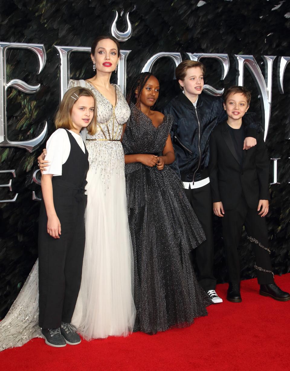 Angelina Jolie and her children Vivienne, Zahara, Shiloh, and Knox attend the European premiere of Maleficent: Mistress of Evil in London.
