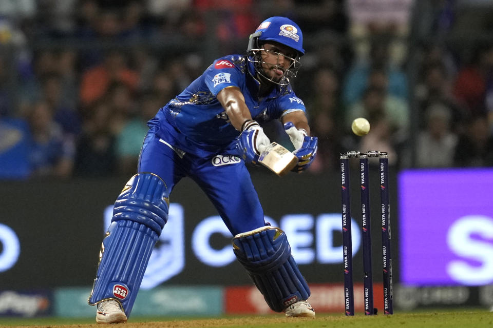 Mumbai Indian's Tilak Varma plays a shot during the Indian Premier League cricket match between Mumbai Indians and Rajasthan Royals in Mumbai, India, Sunday, April 30, 2023. (AP Photo/Rajanish Kakade)