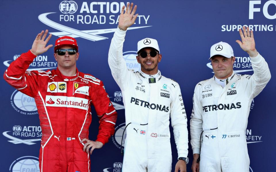 Lewis Hamilton (C) will start on pole in Baku ahead of Valtteri Bottas (R) and Kimi Raikkonen (L). - Getty Images Europe