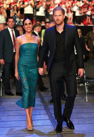 <p>Chris Jackson/Getty Images</p> Prince Harry and Meghan Markle at the 2023 Invictus Games in Germany.
