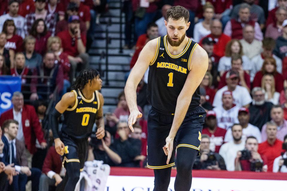 Mar 5, 2023; Bloomington, Indiana, USA; Michigan Wolverines center Hunter Dickinson (1) celebrates a made basket in the first half Indiana Hoosiers at Simon Skjodt Assembly Hall.