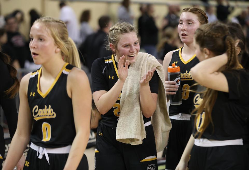 Caddo's Kadey McKay (center) scored 13 points Thursday in a 44-40 win against Red Oak in the Class A state quarterfinals.