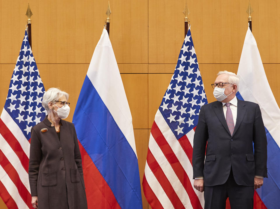 US Deputy Secretary of State Wendy Sherman, left, and Russian deputy foreign minister Sergei Ryabkov attend security talks at the United States Mission in Geneva, Switzerland, Monday, Jan. 10, 2022. (Denis Balibouse/Pool via AP)