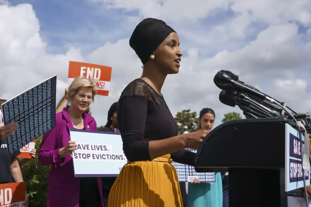 Rep. Ilhan Omar, D-Minn., joined at left by Sen. Elizabeth Warren, D-Mass., and Rep. Alexandria Ocasio-Cortez, D-N.Y., right, speaks about the Keeping Renters Safe Act of 2021, at the Capitol in Washington, Sept. 21, 2021. (AP Photo/J. Scott Applewhite, File)