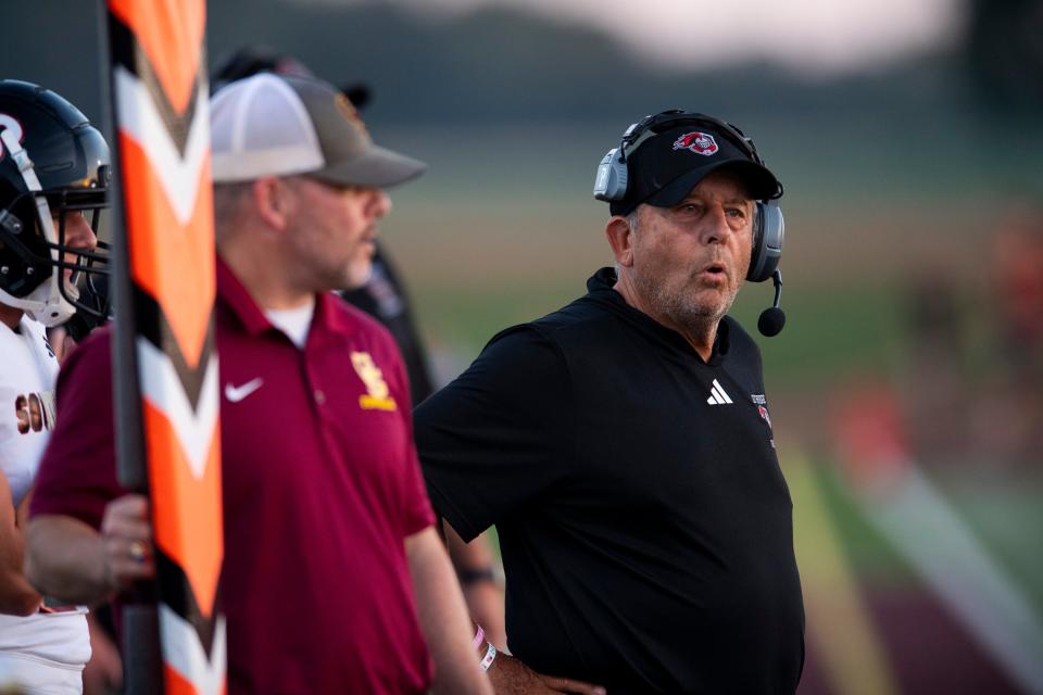 Southridge defensive coordinator Steve Winkler coaches from the sideline as the Raiders play the Gibson Southern Titans in Fort Branch, Ind., Friday, Sept. 15, 2023.