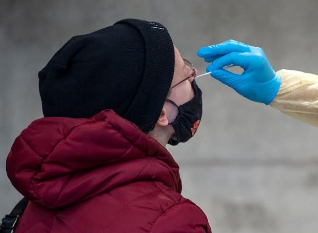 A swab is taken at a pop-up COVID-19 testing site on the Dalhousie University campus in November.