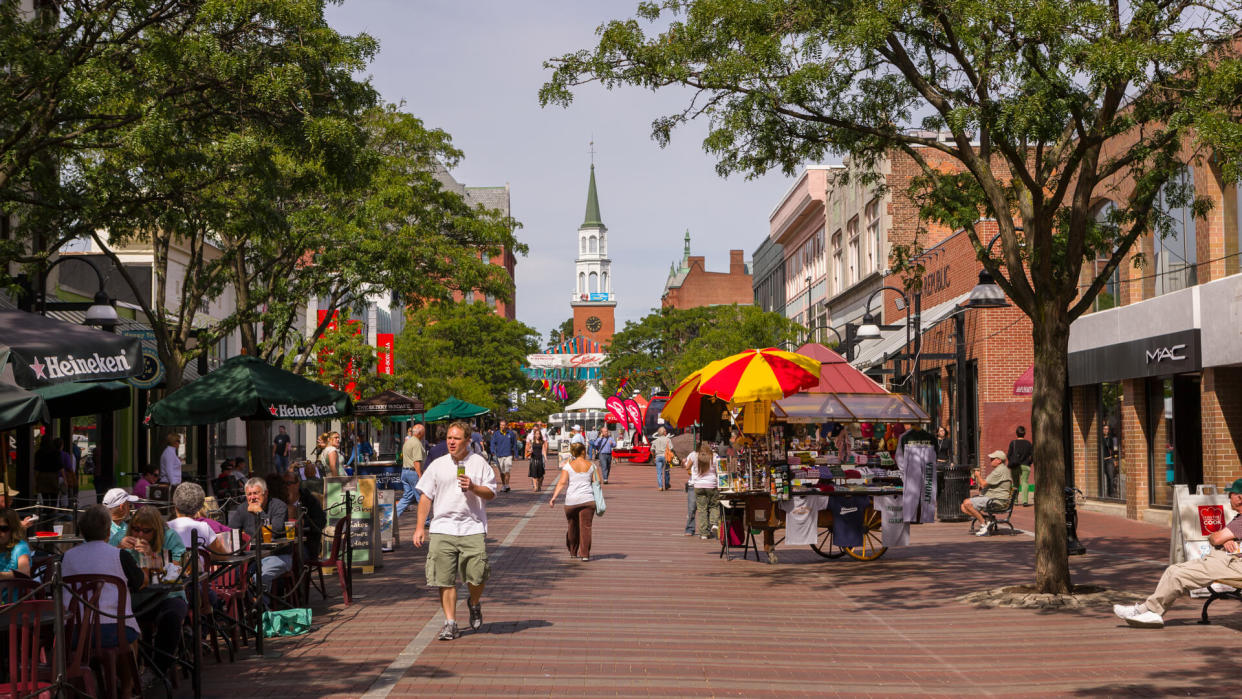 BURLINGTON, VERMONT, USA - SEPTEMBER 11, 2009: People on Church Street, a pedestrian mall with sidewalk cafes and restaurants.