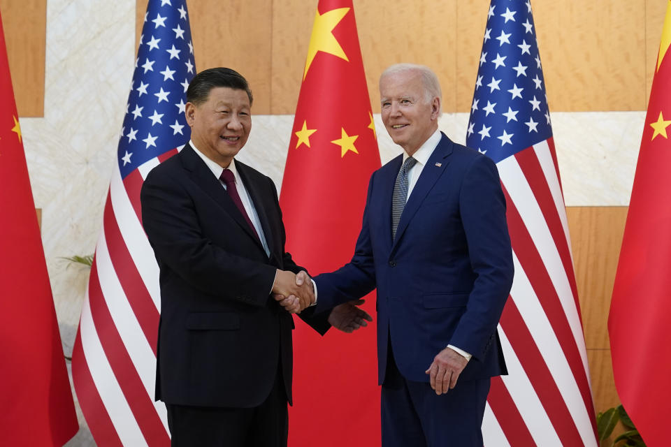 U.S. President Joe Biden shakes hands with Chinese President Xi Jinping before their meeting on the sidelines of the G20 summit meeting, Monday, Nov. 14, 2022, in Nusa Dua, in Bali, Indonesia. (AP Photo/Alex Brandon)