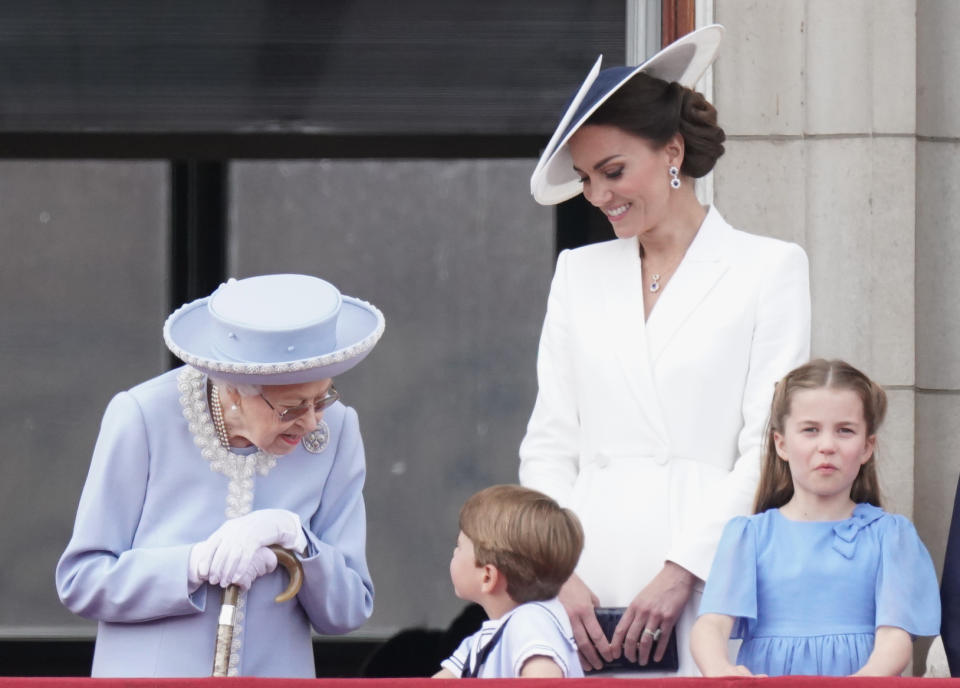 (Left to right) Queen Elizabeth II , Prince Louis, the Duchess of Cambridge, Princess Charlotte, on the balcony of Buckingham Palace, to view the Platinum Jubilee flypast, on day one of the Platinum Jubilee celebrations. Picture date: Thursday June 2, 2022.