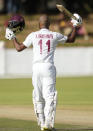 West Indies batsman Kraigg Brathwaite celebrates after scoring 100 runs on the second day of the Test cricket match between Zimbabwe and West Indies at Queens Sports Club in Bulawayo, Zimbabwe, Sunday,Feb, 5, 2023. (AP Photo/Tsvangirayi Mukwazhi)