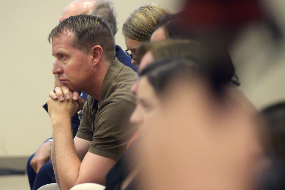 Robbie Parker, parent of Emilie Parker, listens to Attorney Chris Mattei during closing statements in the Alex Jones Sandy Hook defamation damages trial in Superior Court in Waterbury, Conn., on Thursday, Oct. 6, 2022. (H John Voorhees III/Hearst Connecticut Media via AP, Pool)