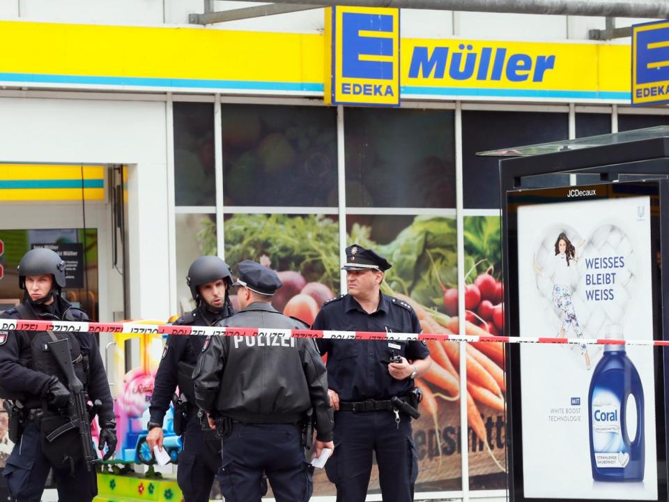 Police outside the supermarket where the attack was carried out(EPA)
