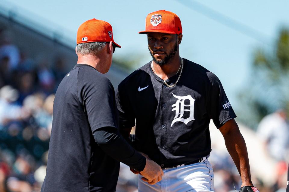 Tigers pitcher Miguel Diaz walks off the field after talking to manager A.J. Hinch during the third inning of the Grapefruit League season opener at Joker Marchant Stadium in Lakeland, Florida, on Saturday, Feb. 24, 2024.