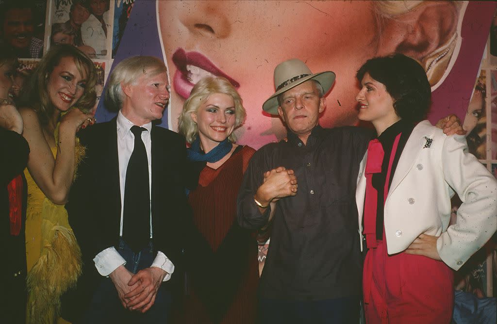 From left to right: Jerry Hall, Andy Warhol, Debbie Harry, Truman Capote, and Paloma Picasso celebrate <em>Interview</em> magazine at Studio 54 in June 1979. (Photo: Sonia Moskowitz/Getty Images)