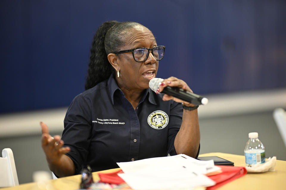 Cynthia Slater, president of the Daytona Beach Branch NAACP, answers a question during the Voters Education 2024 Community Forum, addressing the Florida Legislature's voter suppression tactics, Thursday, May 16, 2024, in Daytona Beach, Fla. Laws passed in several Republican-controlled states are making it challenging for advocates to adapt as they try to register and educate potential voters with just months to go before the presidential election. (AP Photo/Phelan M. Ebenhack)