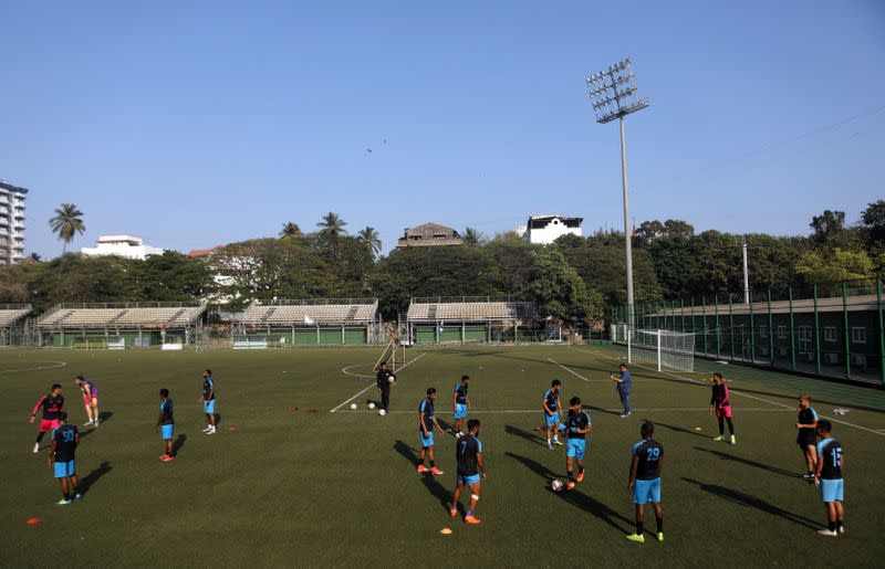 Punjab Football club players are seen during a training session before their match with Indian Arrows at the Cooperage football ground in Mumbai