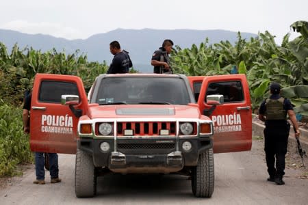 Vigilantes are seen during a patrol at banana plantations in the municipality of Coahuayana