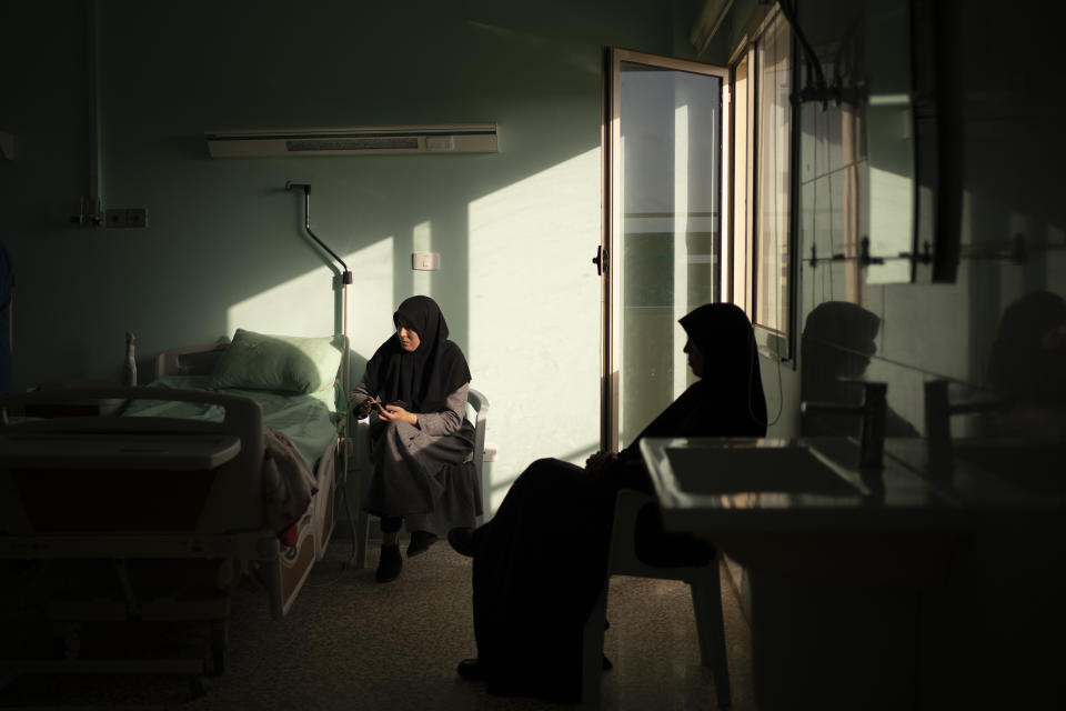 Family members of children having heart surgery wait in a room at the Tajoura National Heart Center in Tripoli, Libya, on Feb. 27, 2020. (AP Photo/Felipe Dana)