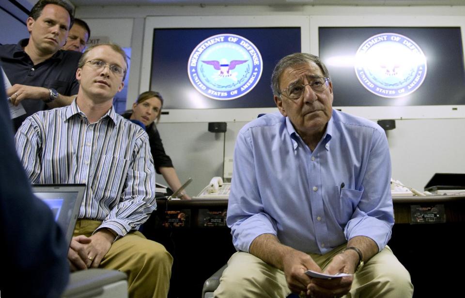 Secretary of Defense Leon Panetta listens to a question during media briefing onboard his plane May 31, 2012 enroute to Singapore from Honolulu, Hawaii. (AP Photo/Jim Watson, Pool)