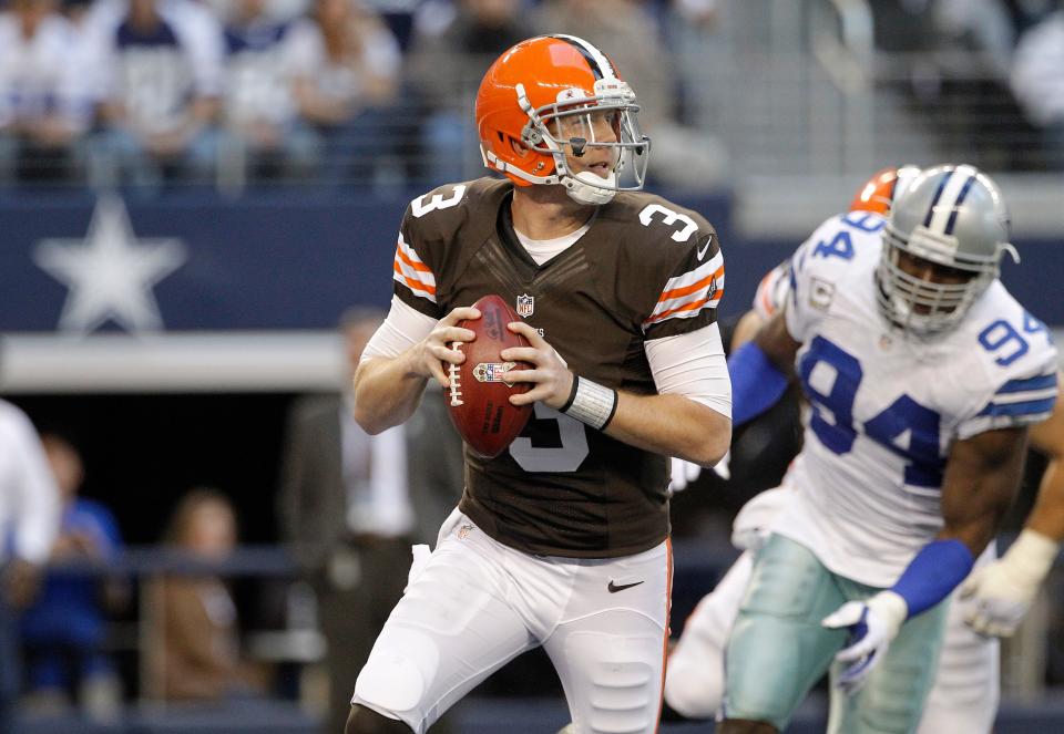 Cowboys defender DeMarcus Ware puts pressure on Browns quarterback Brandon Weeden, Nov. 18, 2012. The Cowboys won in overtime 23-20.