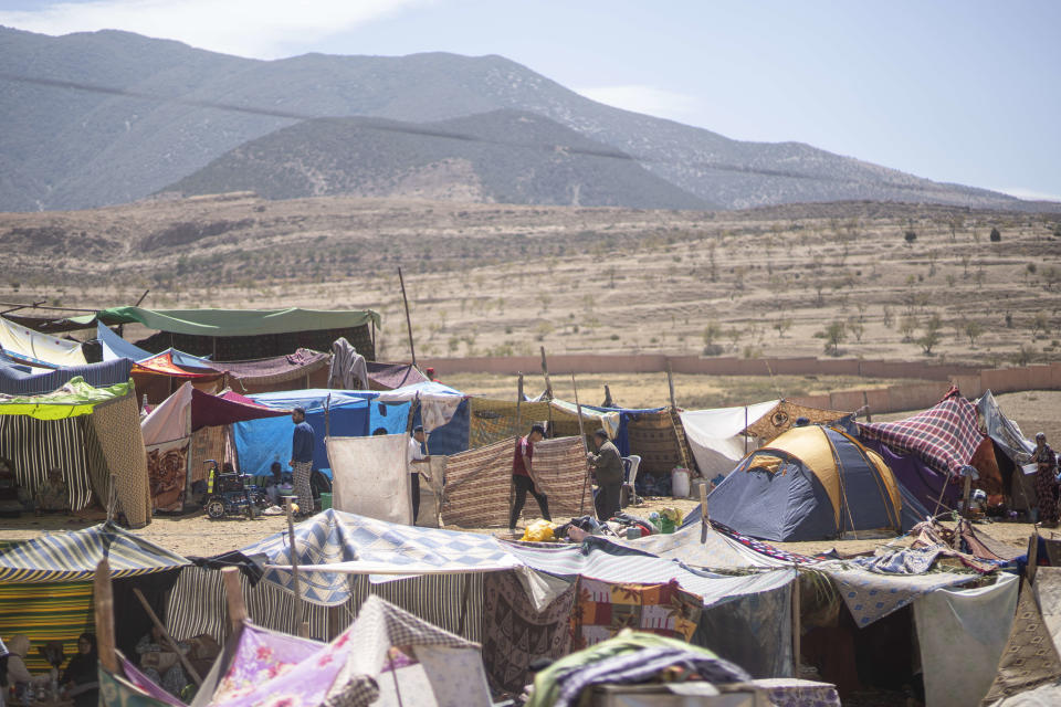 Tents are set up to shelter people who were displaced by the earthquake, in the town of Amizmiz, near Marrakech, Morocco, Sunday, Sept. 10, 2023. Towns and villages throughout Morocco's Atlas Mountains are mourning the dead and seeking aid after a record earthquake wreaked destruction throughout the region last week. (AP Photo/Mosa'ab Elshamy)