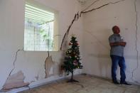 Jose Rinaldo Januario is pictured in his house next to cracks linked to rock salt mining by the petrochemical company Braskem in Maceio