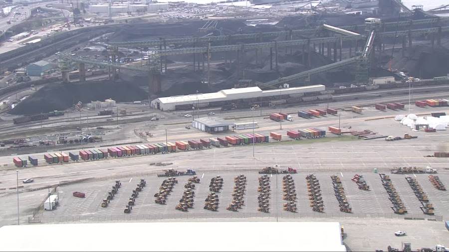 <em>Construction machinery initially destined for Baltimore awaits trucks at Newport News Marine Terminal (WAVY Photo/Chris Wynn)</em>