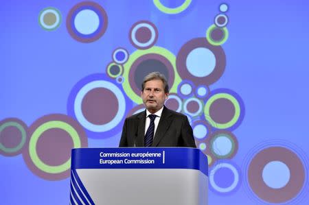 European Neighbourhood Policy and Enlargement Negotiations Commissioner Johannes Hahn gestures during a news conference at the European Commission headquarters in Brussels, Belgium, November 10, 2015. REUTERS/Eric Vidal