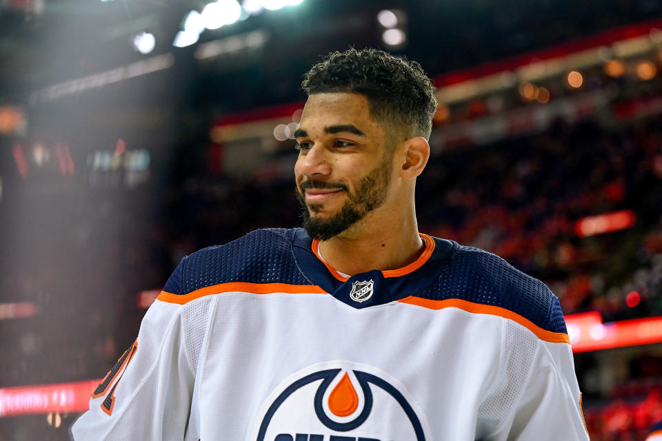 CALGARY, AB - MAY 26: Edmonton Oilers Left Wing Evander Kane (91) smiles at fans during warm ups before game 5 of the second round of the NHL Stanley Cup Playoffs between the Calgary Flames and the Edmonton Oilers on May 26, 2022, at the Scotiabank Saddledome in Calgary, AB. (Photo by Brett Holmes/Icon Sportswire via Getty Images)