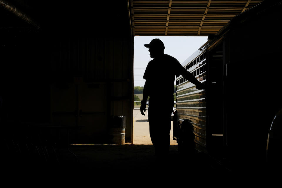 Bart Barber loads equipment into his stock trailer after attending a livestock event in McKinney, Texas, with his daughter Sarah on Saturday, Sept. 24, 2022. (AP Photo/Audrey Jackson)