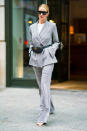 <p>Rosie Huntington-Whiteley stepped out in Soho this week rocking a highly covetable Acne suit and Gucci bum bag. One word: want. <em>[Photo: Getty]</em> </p>